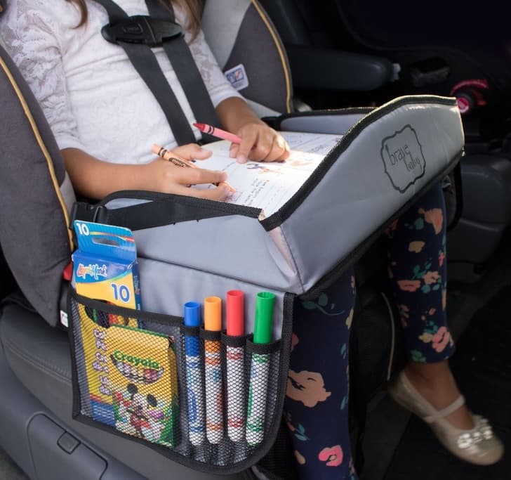 A portable travel tray that keeps your child busy on the road