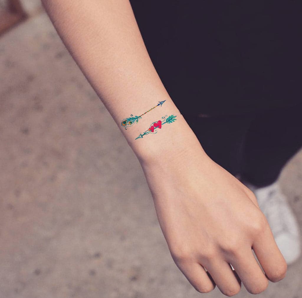 5. Small Arrow Tattoo