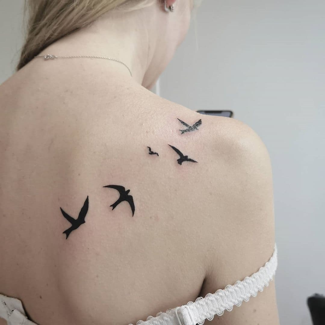 4. Flying birds tattoos for girls