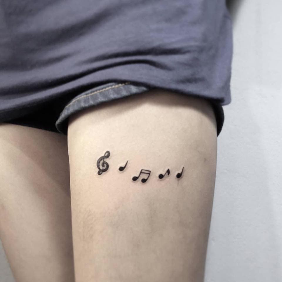 28. Musical Notes Design Tattoos for Women